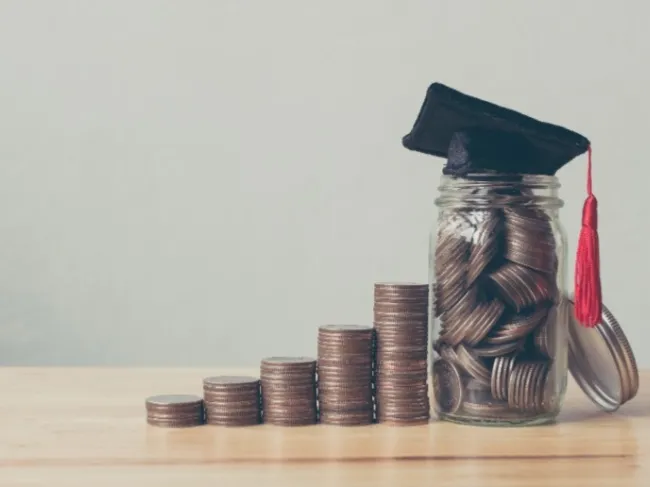 student debt coin stacks